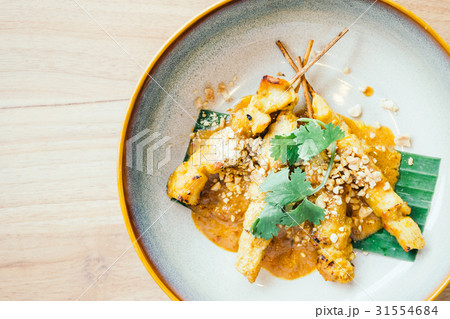 Chicken satay 31554684