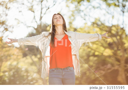 Woman stretching out her arms 31555595