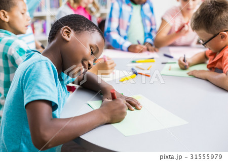 Schoolboy drawing in paper 31555979