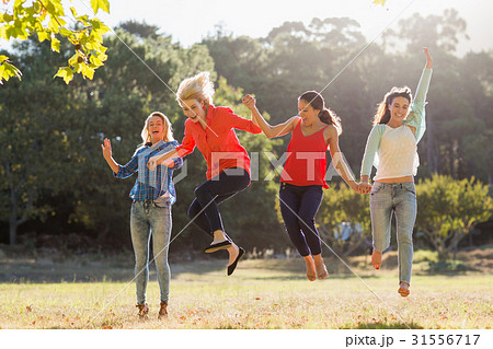 Group of friends having fun in park Group of friends having fun in park 31556717
