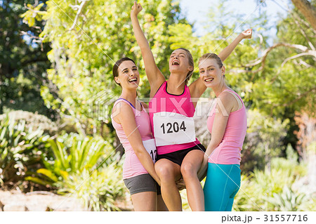 Young athlete women cheering after victory 31557716