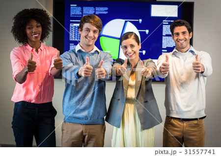 Portrait of business people standing in the conference room Portrait of business people standing in the conference room 31557741