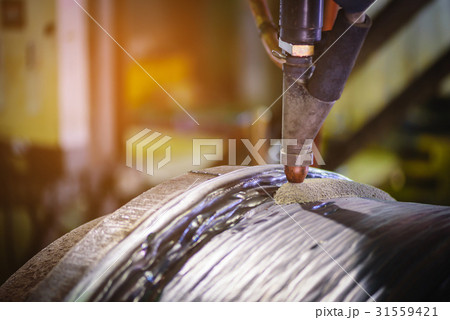 Submerged arc welding process in steel industry. Submerged arc welding process in steel industry. 31559421