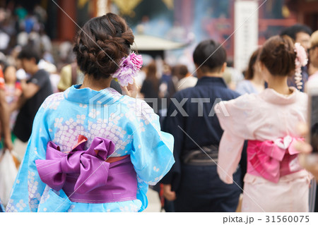 Young girl wearing Japanese kimono standing  31560075