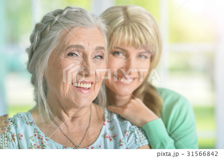 Beautiful young woman with mother 31566842