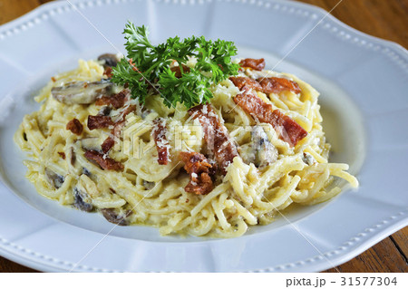Pasta with sausage cheese and greens Pasta with sausage cheese and greens 31577304