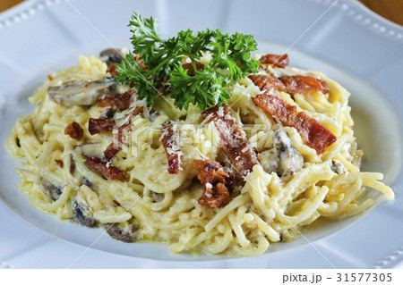 Pasta with sausage cheese and greens Pasta with sausage cheese and greens 31577305