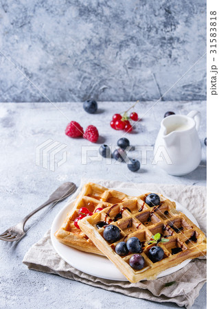 Belgian waffles with berries 31583818