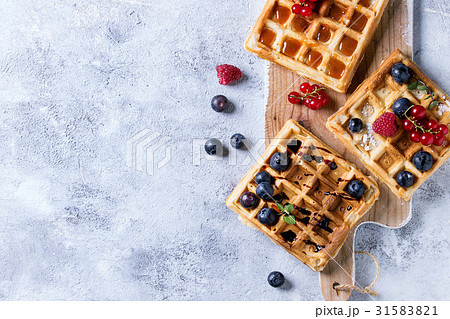 Belgian waffles with berries Belgian waffles with berries 31583821