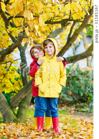 Two little best friends and kids boys autumn park Two little best friends and kids boys autumn park 31585167