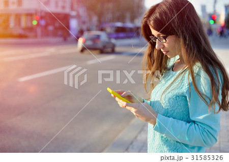 Beautiful young businesswoman write on smartphone 31585326