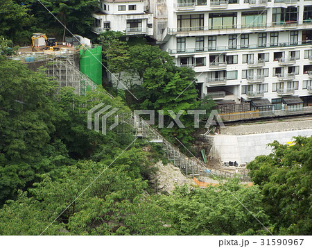 山間部・急傾斜地での工事にはモノレールが活躍します 山間部・急傾斜地での工事にはモノレールが活躍します 31590967