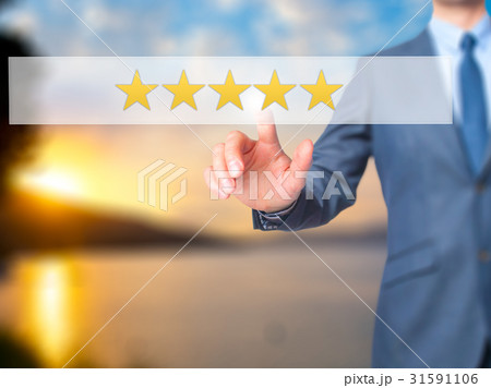 Five star rating Businessman hand pressing button Five star rating Businessman hand pressing button 31591106