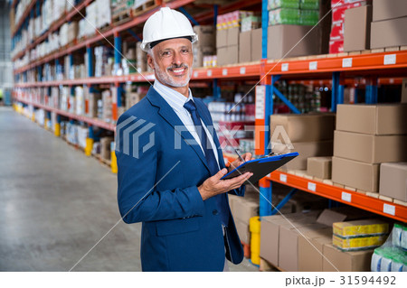 Business man looking the camera Business man looking the camera 31594492