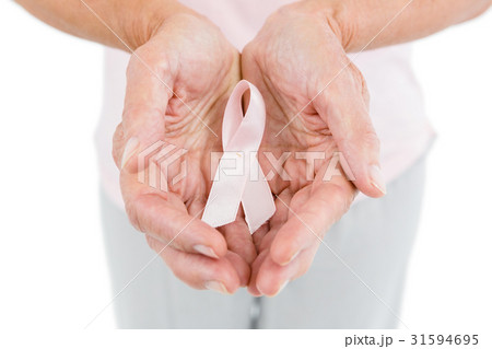 Midsection of woman showing anti-violence ribbon Midsection of woman showing anti-violence ribbon 31594695