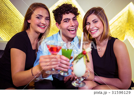 Portrait of happy friends in nightclub Portrait of happy friends in nightclub 31596129