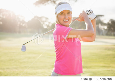 Portrait of woman golfer smiling Portrait of woman golfer smiling 31596706