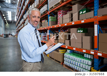 Worker holding clibpoard 31597668