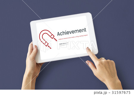 Hands working on digital device network graphic overlay 31597675