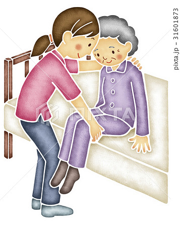 お年寄りの体を起こす介護士 31601873