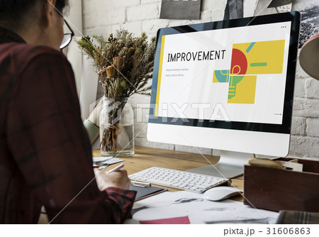 Woman working on computer network graphic overlay 31606863