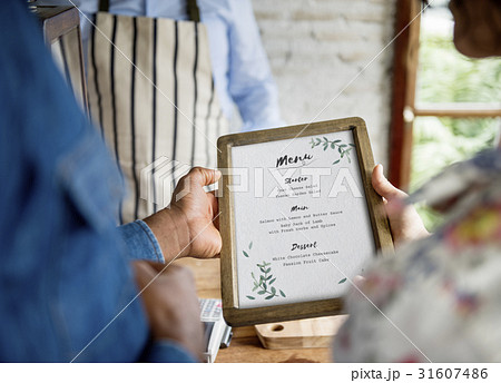 People is selecting order from menu People is selecting order from menu 31607486