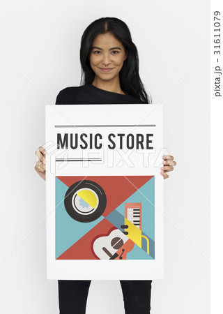Woman holding banner of music audio passion...の写真素材 [31611079