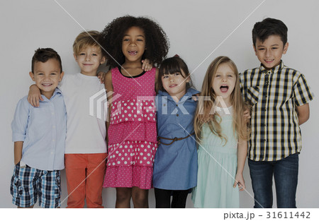 Diverse group of kids standing in a row portrait Diverse group of kids standing in a row portrait 31611442