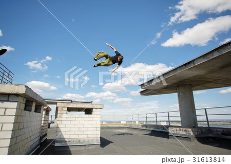 Man flips on roof Man flips on roof 31613814