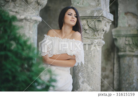 brunette in a dress brunette in a dress 31615159