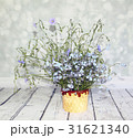 bouquet of wildflowers on a wooden table 31621340