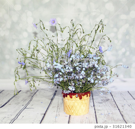 bouquet of wildflowers on a wooden table bouquet of wildflowers on a wooden table 31621340