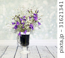 bouquet of wildflowers on a wooden table 31621341
