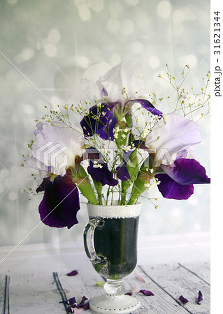 Picturesque bouquet with irises and wildflowers Picturesque bouquet with irises and wildflowers 31621344