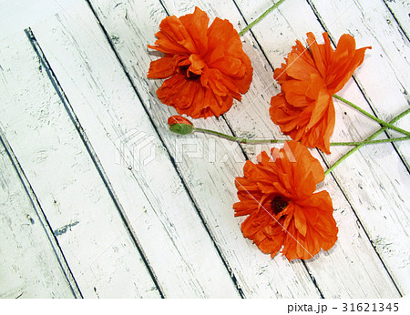 poppy flowers on a wooden table, rustic background poppy flowers on a wooden table, rustic background 31621345