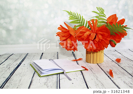 Bouquet in a bamboo vase with red poppies Bouquet in a bamboo vase with red poppies 31621348