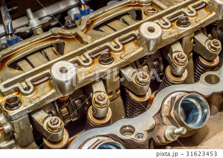 Close up of parts in engine head Close up of parts in engine head 31623453