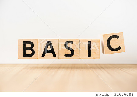 floating wooden cube with word " BASIC " concept 31636082