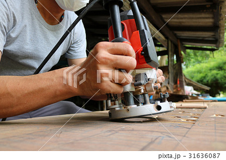 Electric routering to cut down stripes on the wood Electric routering to cut down stripes on the wood 31636087