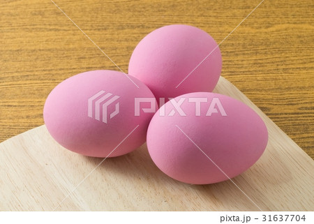 Three Pink Century Egg on A Wooden Board Three Pink Century Egg on A Wooden Board 31637704