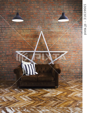 Interior of loft with velvet sofa and lamp 31639665