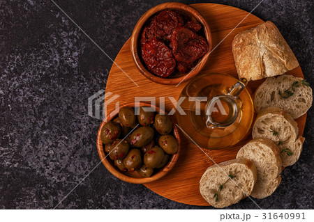 Fresh bread with snacks. 31640991