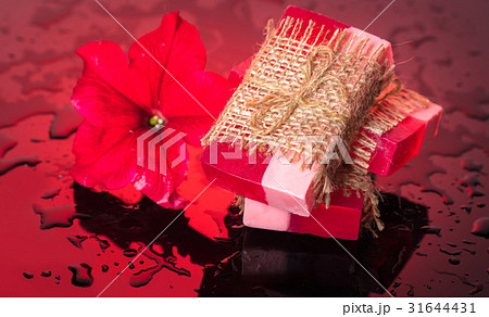 Handmade soap red with a flower petunia Handmade soap red with a flower petunia 31644431