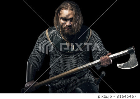 Viking in armor and axe on black background 31645467