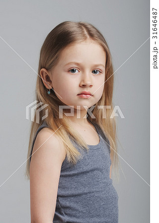 little girl studio portrait on grey background little girl studio portrait on grey background 31646487