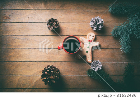 Cup of coffee and Christmas gingerbread man Cup of coffee and Christmas gingerbread man 31652436
