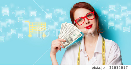 women in red glasses with money women in red glasses with money 31652617