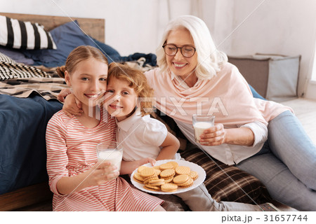 Joyful nice boy hugging his sister Joyful nice boy hugging his sister 31657744