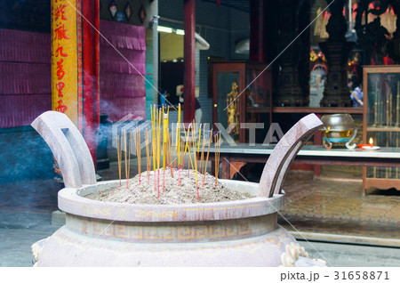 Burning incense sticks Burning incense sticks 31658871