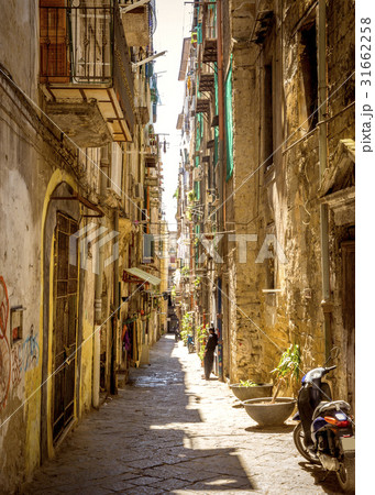 Narrow street in old town of Naples city in Italy 31662258